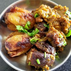 A picture of Stuffed Brinjals and Potatoes.