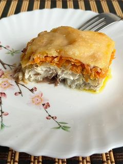 Фото Скумбрія під овочами та сиром.