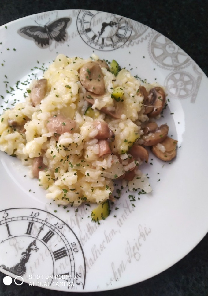 Una foto de Risotto con champiñones y calabacín
