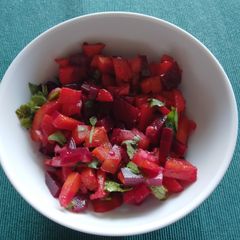 A picture of Carrot, tomato, beetroot, fenugreek salad.
