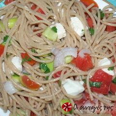 A picture of Spaghetti with tomato salad.