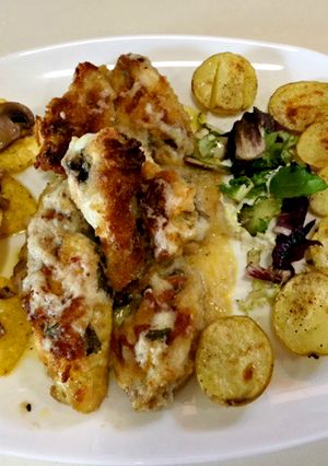 Una foto de Alitas de pollo rebozadas con queso