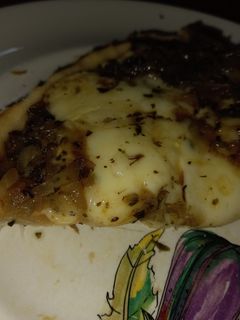 Una foto de Tarta de cebolla y queso 🧀