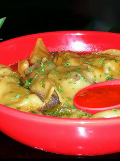 A picture of Mike's Thai Beef Dumpling Soup.