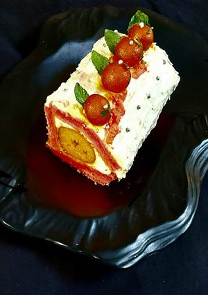 A picture of Gulab Jamun Swiss Roll.