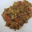 Coles de Bruselas con tocino en salsa de tomate