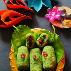 A picture of Dates and paan rolls.