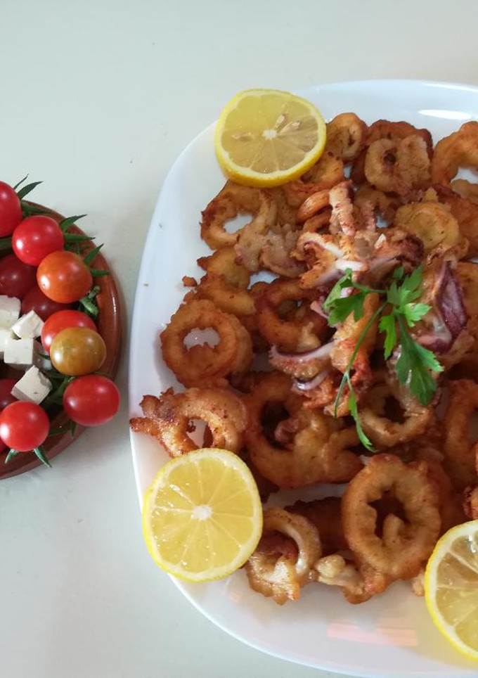 Una foto de Calamares enharinados con cerveza
