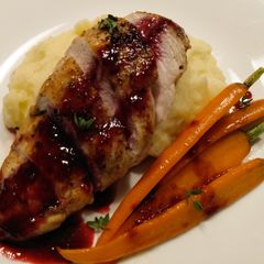 A picture of Pan-seared chicken with blackberry gastrique.