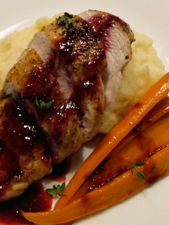 A picture of Pan-seared chicken with blackberry gastrique.