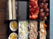 A picture of tuna egg tomato carrots