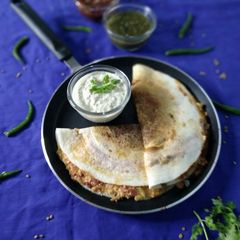 A picture of Schezwan paneer masala dosa.