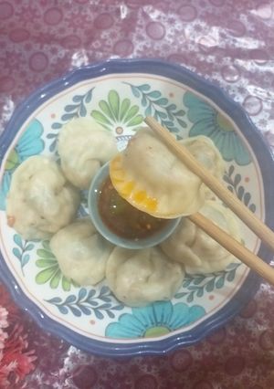 A picture of Chicken momos (dumplings).