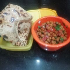 A picture of Carrom Seeds Paratha with black chana chaat.