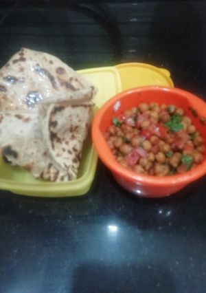 A picture of Carrom Seeds Paratha with black chana chaat.