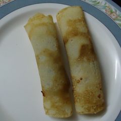 A picture of Eggless Crepe with Roasted Onions.
