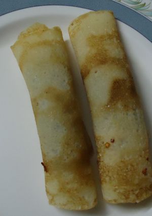 A picture of Eggless Crepe with Roasted Onions.