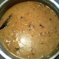 A picture of Mung dal with fish head.