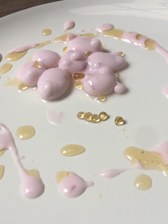 A picture of Molecular gastronomy-mango juice spherification.