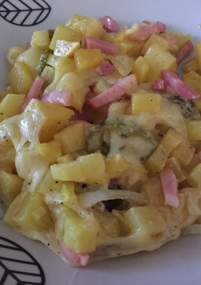 Una foto de Patatas con queso fundido