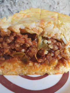 Una foto de Pastel de arroz y carne
