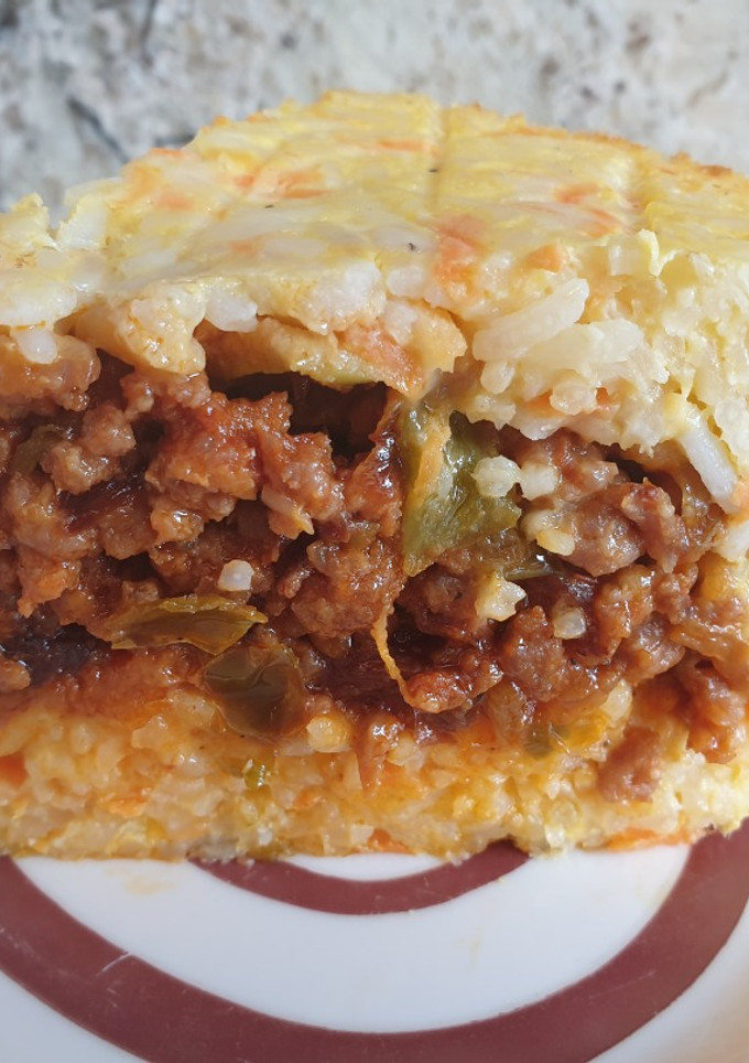 Una foto de Pastel de arroz y carne