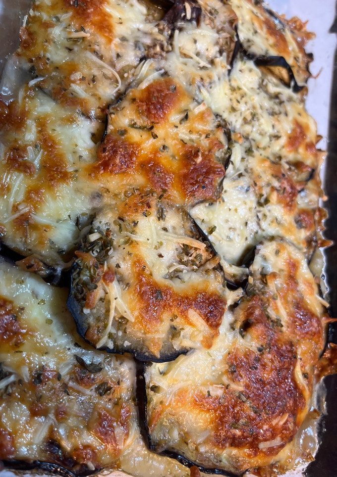 Una foto de Berenjenas a la parmiggiana con puré