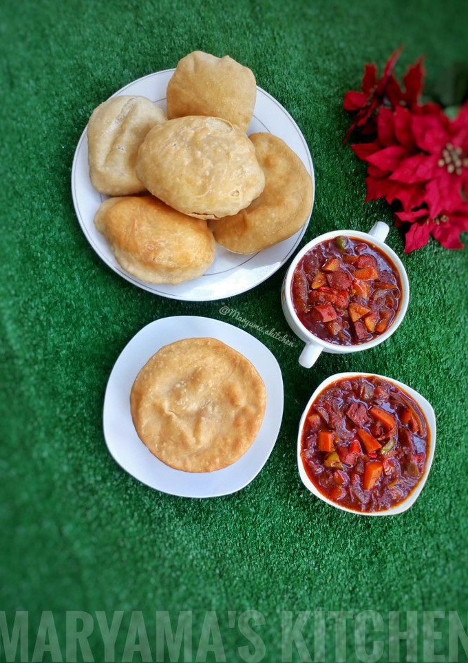 A picture of Pateera with sausage vegetable soup.