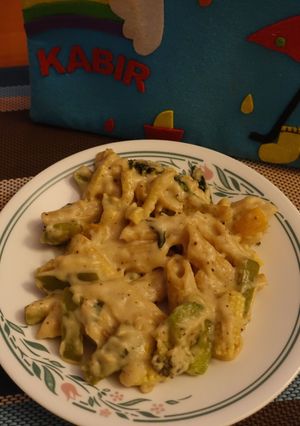 A picture of Whole wheat pasta with white sauce.