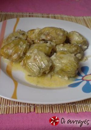 A picture of Zucchini flowers with egg and lemon sauce.
