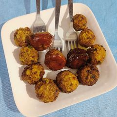A picture of Leftover rice & Louki balls.