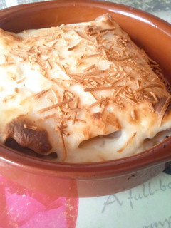 Una foto de Canelones de alcachofas, jamón y champiñones