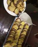 Galletas de vainilla y chocolate con glaseado de naranja