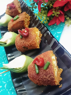 A picture of Moong Dal-Suji Roll with Paneer Stuffing.