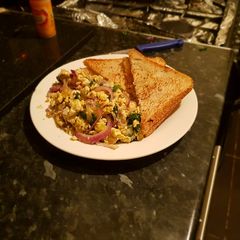 A picture of Simple Scrambled Eggs with Toast.