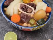 Una foto de sopa de ossobuco