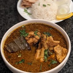 A picture of Desi Chicken Curry.