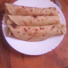 A picture of Coconut & carrot chapati#Theme challenge.