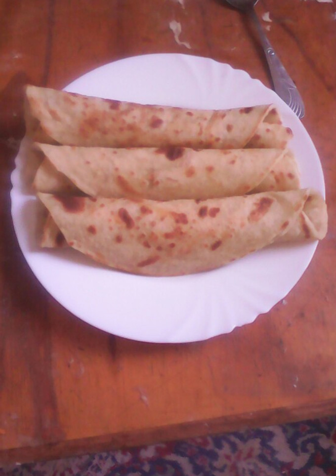 A picture of Coconut & carrot chapati#Theme challenge.