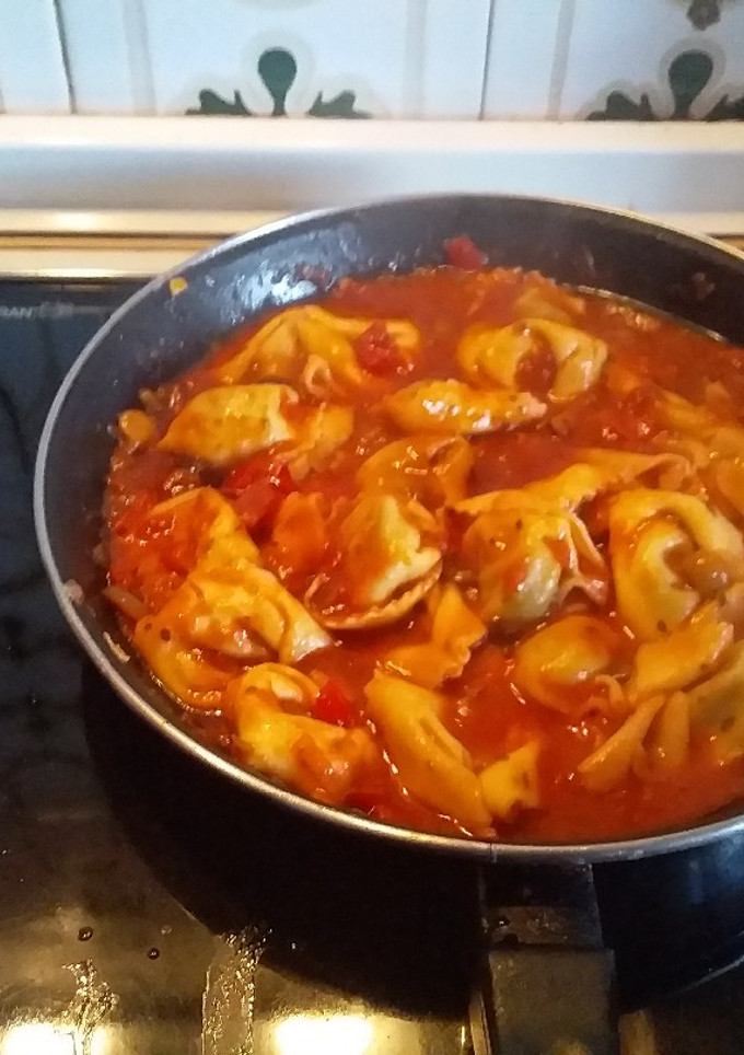 Una foto de Tortelinis rellenos de espinacas por el chef David