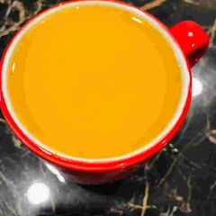 A picture of Turmeric orange juice.
