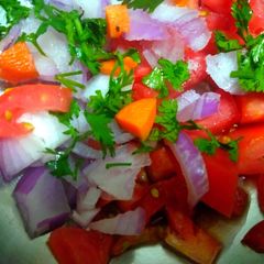 Onian tomato carrot salad A picture of Onian tomato carrot salad.