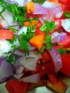A picture of Onian tomato carrot salad.