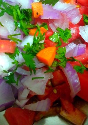 A picture of Onian tomato carrot salad.