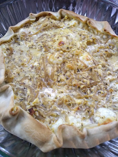 Una foto de Tarta de cebolla y queso