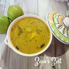 A picture of Tok Daal Aam Diye/Kacha Aam Diye Tok Daal - A Bengali Style Mosur Daal.