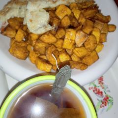 A picture of Fried plantain and eggs.