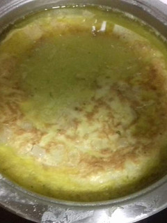 Una foto de Tortilla de patata guisada