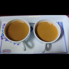 Ginger cardamom milk tea A picture of Ginger cardamom milk tea.