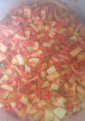 Una foto de Longaniza c/ papas a la Mario, s